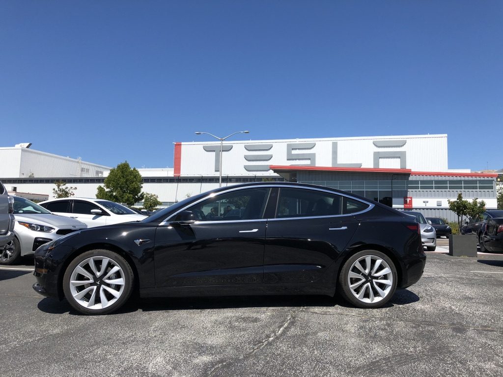 In front of the Tesla plant in Fremont, CA